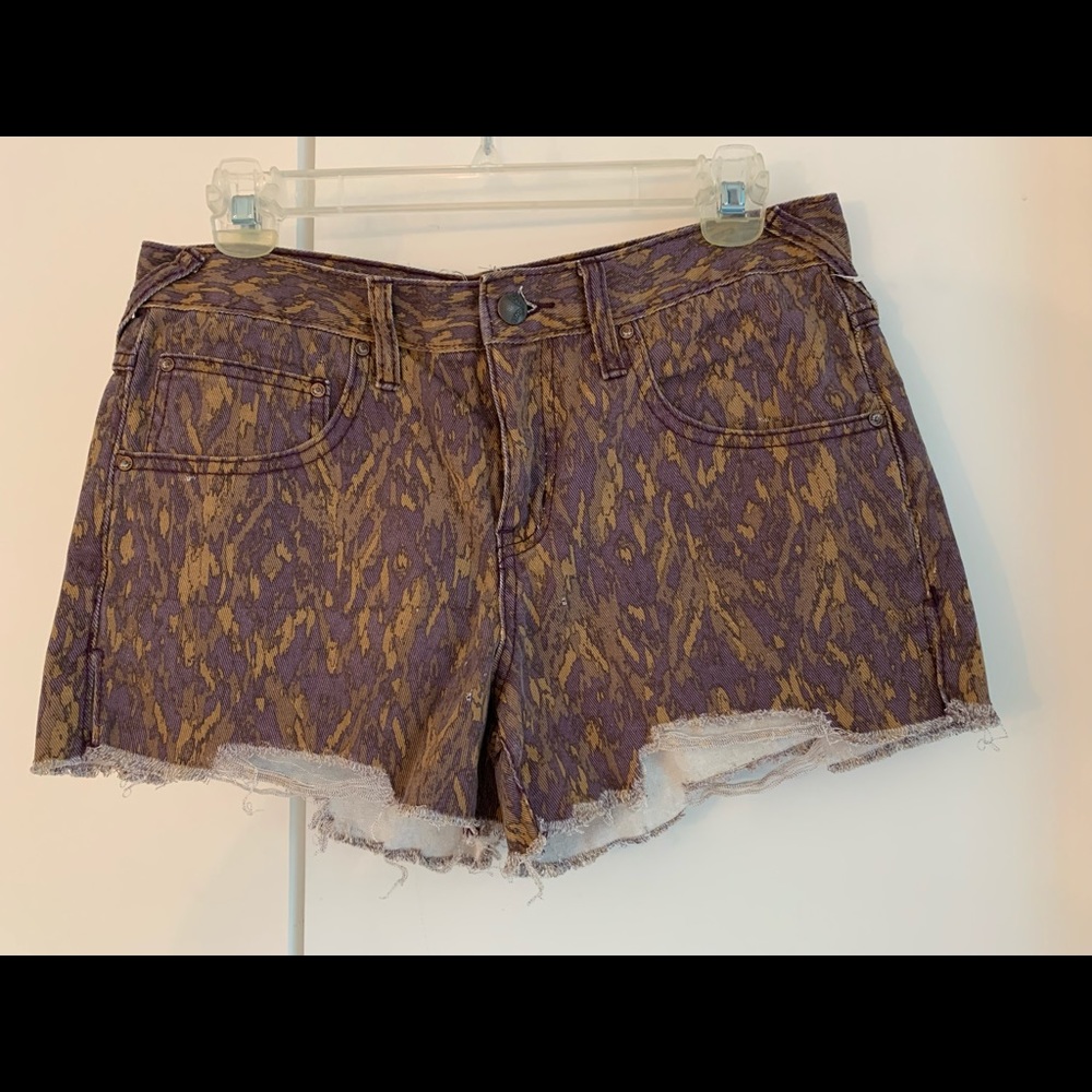 Free People cut off denim shorts.